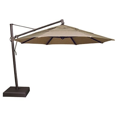 A tan umbrella on a stand.