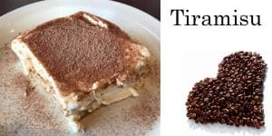 Plate with tiramisu and coffee beans.