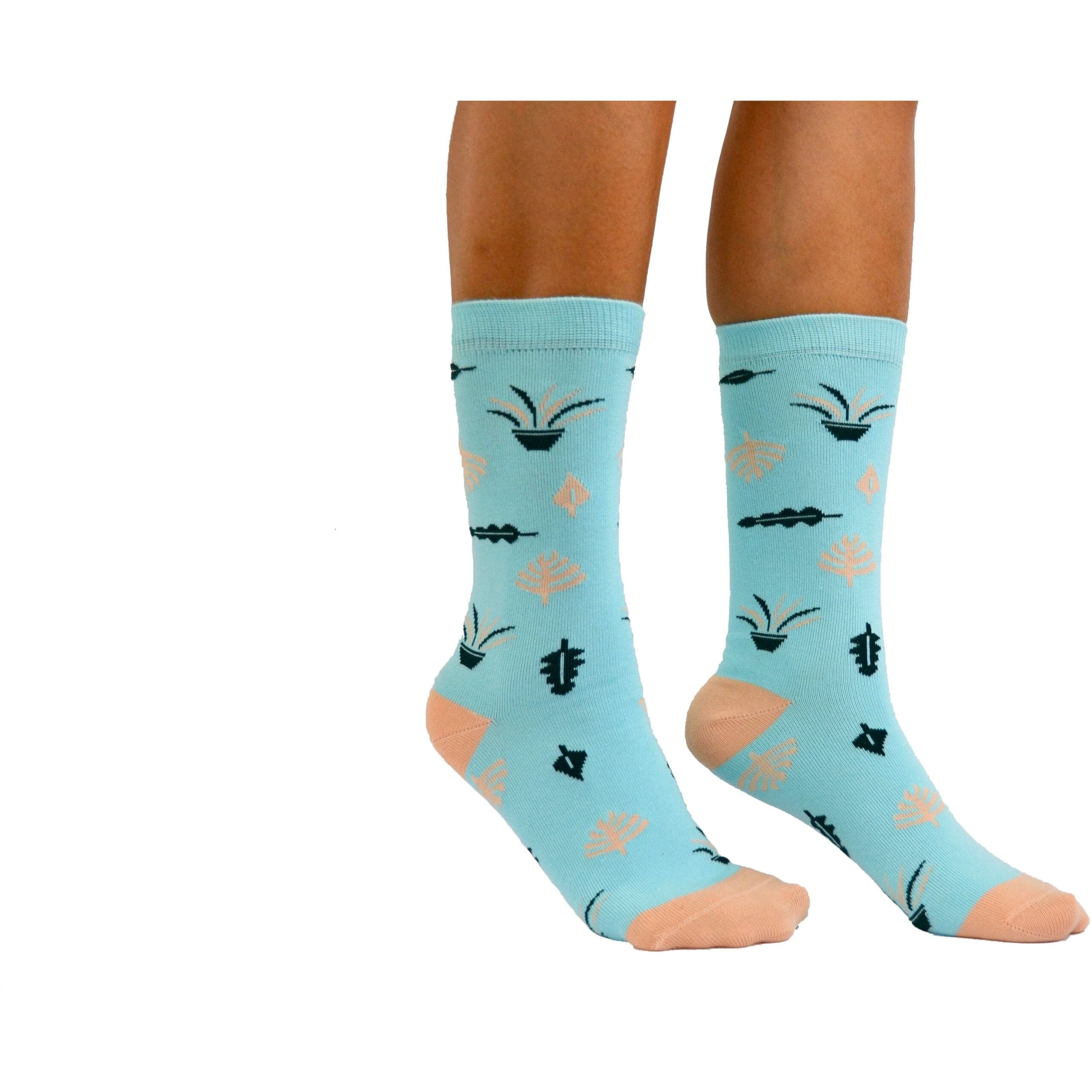 A pair of women's socks with birds on them, available at the best plant nursery near me.