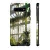 A Victorian Green House Tough Phone Case by Green Thumb Nursery featuring an image of a greenhouse from the best garden center near me.