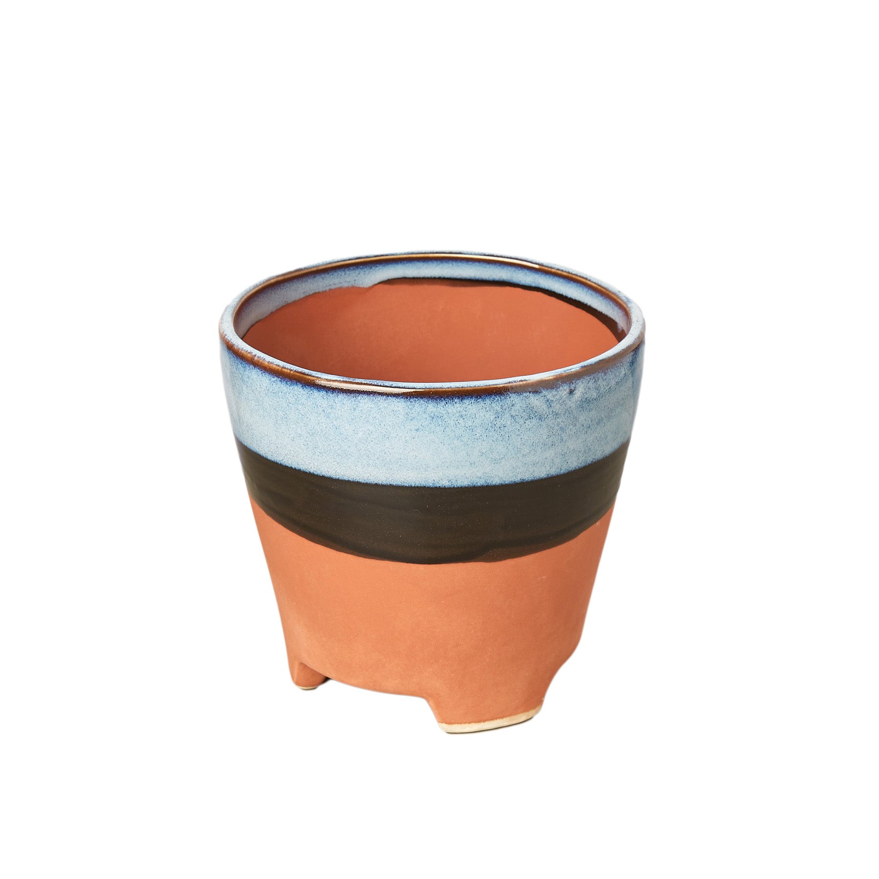 A small pot with a blue, orange and black stripe available at the best garden center near me.