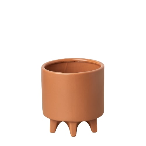 A small terracotta planter on a white background available at a garden center near me.