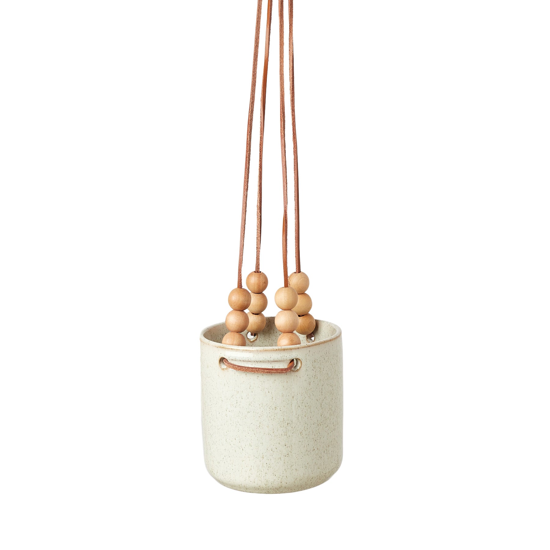 A hanging pot with wooden beads that complements any garden center or plant nursery.