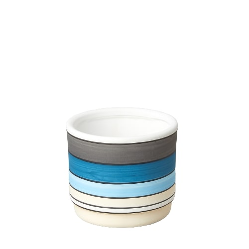 A blue and white ceramic cup with stripes on it, available at a garden center near me.
