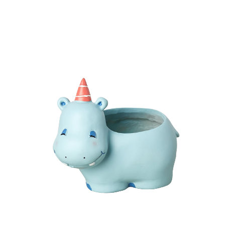 A blue hippopotamus planter wearing a festive party hat, available at the best garden center near me.