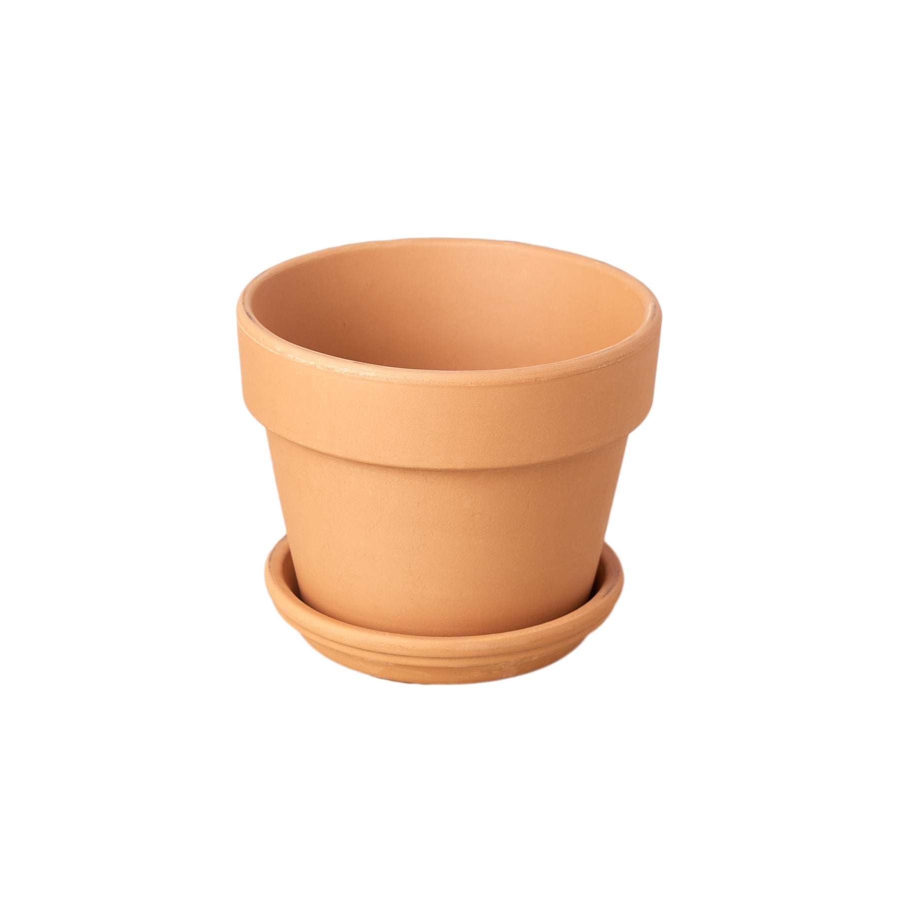 A small clay pot on a white background, perfect for your garden or plant nursery needs.