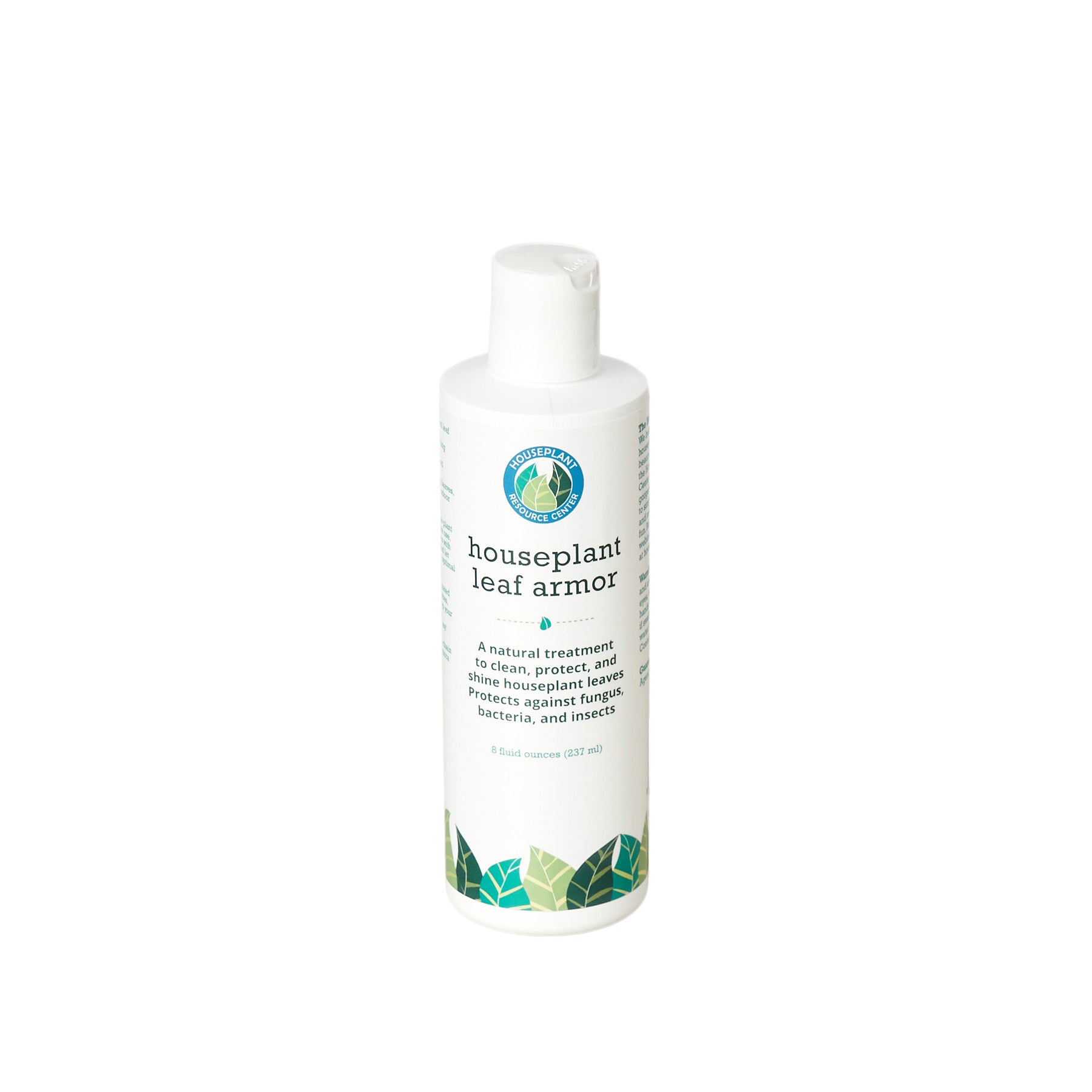 A refreshing bottle of body wash adorned with green leaves on a clean white background.