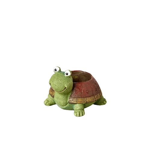 A turtle planter against a black background.