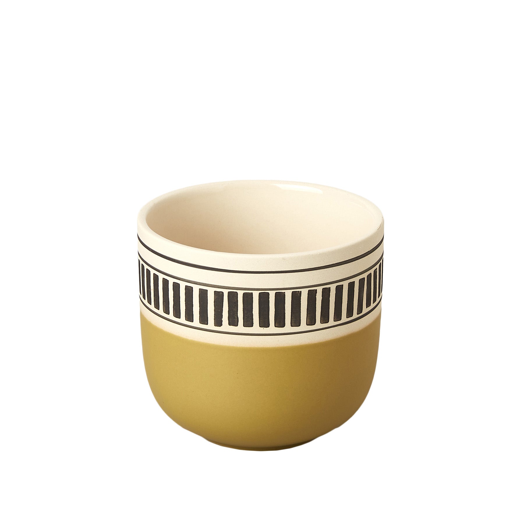 A yellow cup with black and white stripes on it that would make a perfect addition to the best garden nursery near me.
