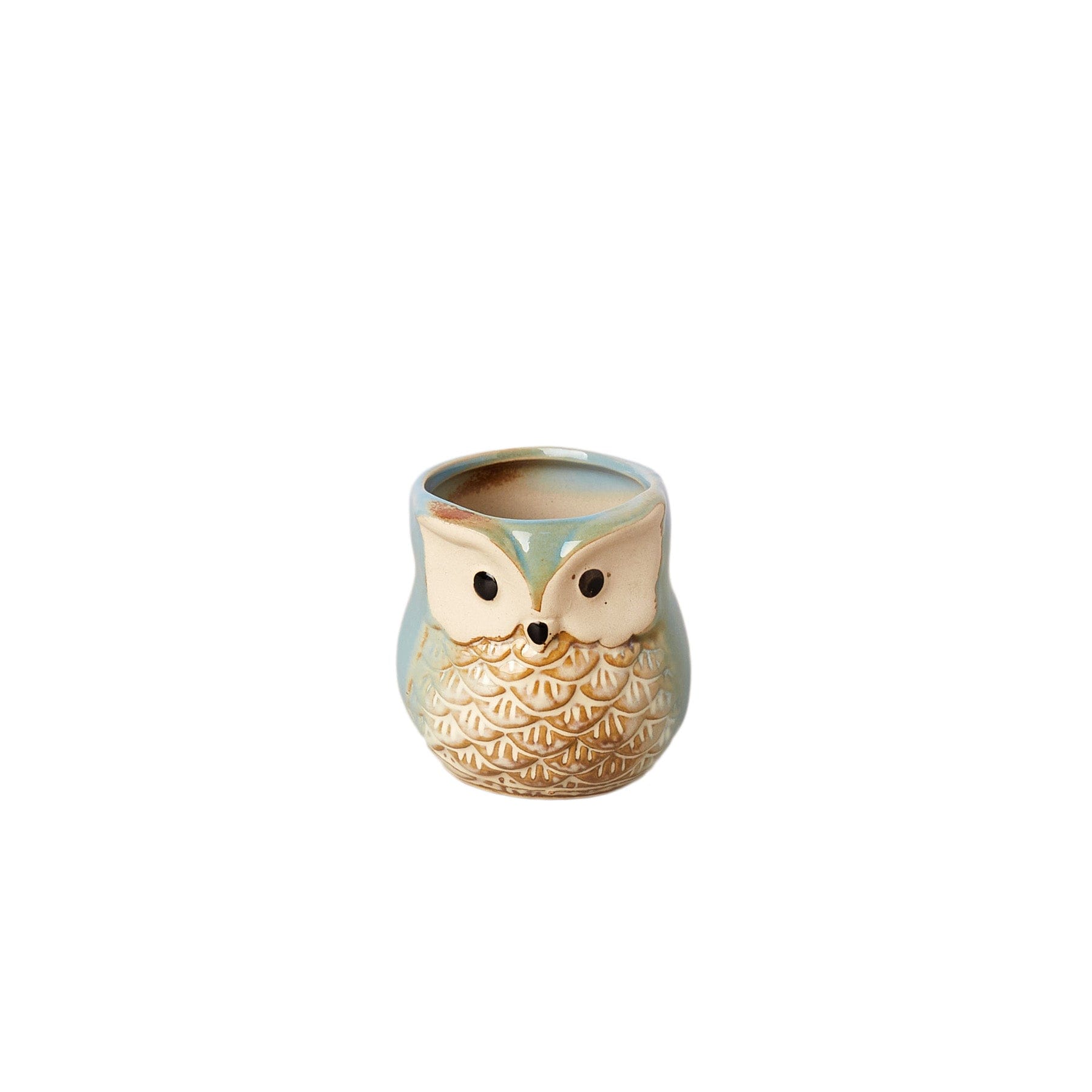 An owl shaped ceramic mug on a white background.