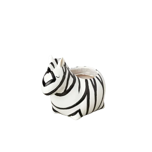 A small zebra shaped planter on a black background at a top garden center near me.