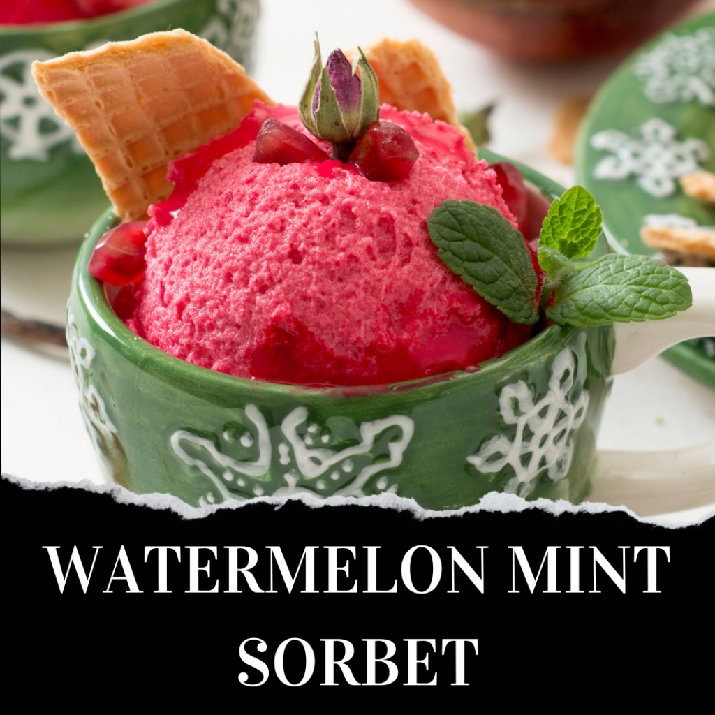 A bowl of bright pink watermelon mint sorbet garnished with fresh mint leaves and a watermelon slice, served in a decorative green bowl with a waffle cone piece.