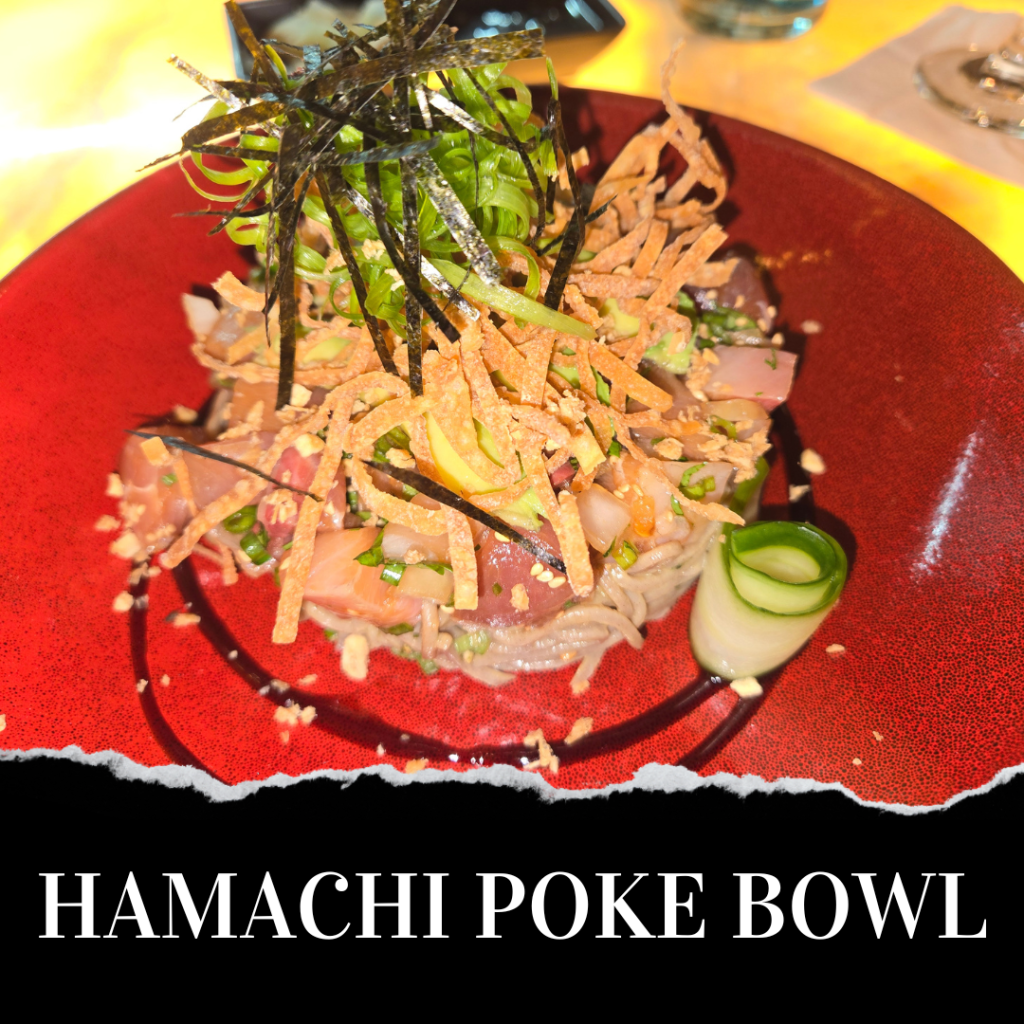 A hamachi poke bowl on a red plate, topped with sliced nori, crispy strips, cucumber, and green onions.