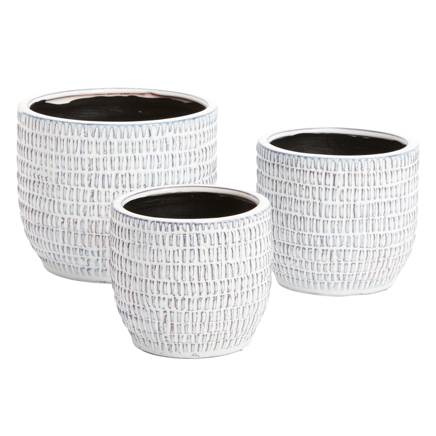 Three white ceramic planters with a woven texture pattern, varying in size, displayed side by side.